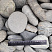 Kamenclub.ru: Галька речная окат (темно-серая) фр. 70-150 мм. купить  в Истре галька речная темно-серая, синяя, серая речная галька округлая  8000 руб/т   фото КАМЕНЬ КЛУБ